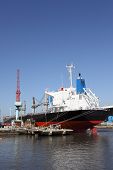 foto of blue sky  - New building ship in shipyard against a blue sky - JPG 