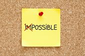 foto of business concept  - The word Impossible turning into Possible on yellow sticky note - JPG 