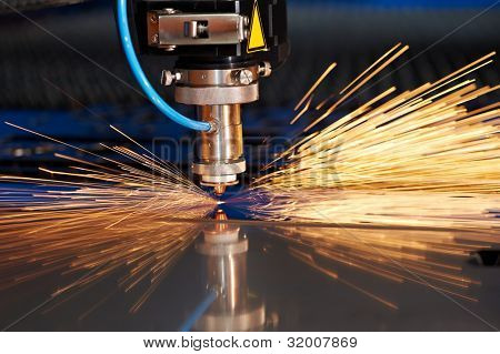 Picture or Photo of Industrial Laser cutting processing manufacture technology of flat sheet metal steel material with sparks