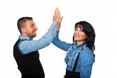 stock photo of business people  - Executive businesspeople give high five and looks satisfied of their business isolated on white background - JPG 
