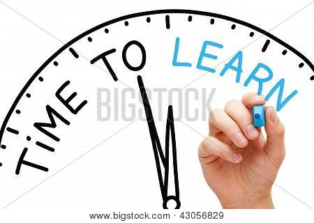 Picture or Photo of Hand writing Time to Learn concept with blue marker on transparent wipe board.