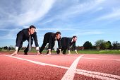 image of business people  - Business people lined up for race - JPG 