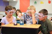 stock photo of science  - Elementary school students doing science experiment - JPG 