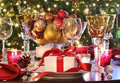 picture of holidays  - Elegant  holiday table setting with red ribbon gift - JPG 