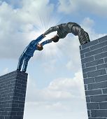picture of bridge  - Building a bridge with a business team of two businessmen working together in a strong support partnership bridging the gap to connect in a successful solution to financial challenges - JPG 
