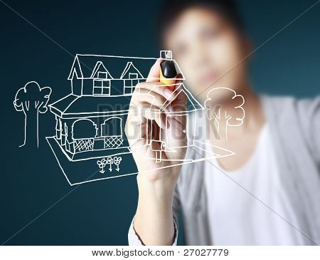 Picture or Photo of Hand drawing house in a whiteboard
