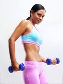 picture of fitness  - Young Woman doing fitness exercise with a hand weights - JPG 