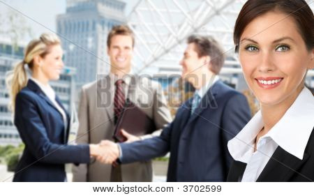 Picture or Photo of Business people meeting in the downtown. Businessmen and business woman
