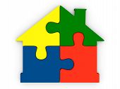 foto of puzzle  - House symbol made of four colorful puzzle pieces - JPG 