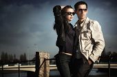 picture of bridge  - Attractive young couple wearing sunglasses - JPG 