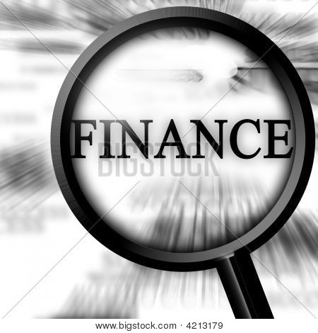 Picture or Photo of Finance in the paper with a magnifier