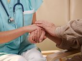 pic of nurse  - Closeup of joined hands of nurse and elderly patient - JPG 