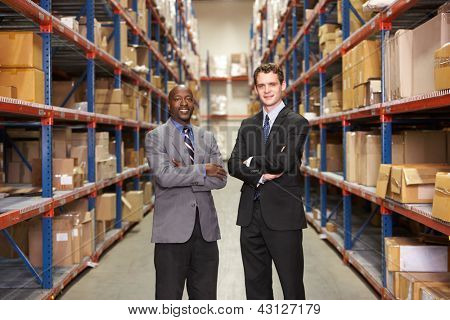 Picture or Photo of Portrait Of Two Businessmen In Warehouse