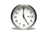 picture of clock  - An aluminum clock that reads 5 O - JPG 