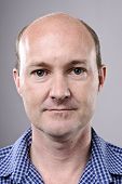 picture of normal  - Normal bald man poses for portrait in studio - JPG 