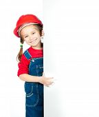 picture of construction  - smiling little girl in the construction helmet with a white board - JPG 