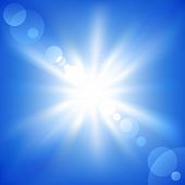 foto of blue sky  - vector illustration of a sun on a blue sky - JPG 