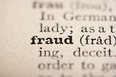 picture of fraud  - Word fraud from the old dictionary a close up - JPG 