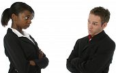 pic of business people  - Young attractive team looking at each other with unhappy expressions over white background - JPG 