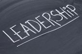 pic of leadership  - leadership word in white chalk handwriting on blackboard - JPG 