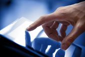 foto of future  - Man hand touching screen on modern digital tablet pc - JPG 