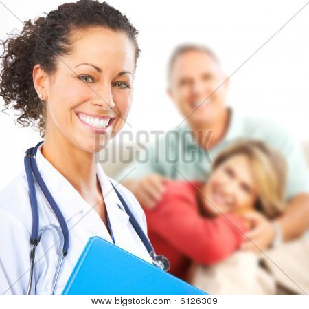 Picture or Photo of Smiling medical doctor with stethoscope and elderly couple