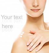 image of beauty  - Young beautiful woman applying moisturizer to her skin after shower - JPG 