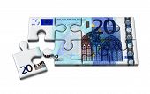 picture of puzzle  - Incomplete jigsaw puzzle with 20 euro image on it - JPG 