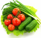 stock photo of over white  - Fresh vegetable on  plate over white background - JPG 