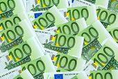 image of investment  - many einhhundert euro banknotes lie side by side - JPG 