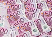 picture of investment  - many of five hundred euro banknotes lie side by side - JPG 