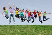 foto of group  - Happy smiling diverse group of jumping teenager people - JPG 