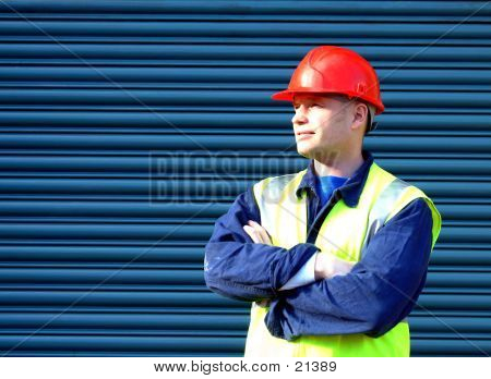 Picture or Photo of Construction worker with arms folded