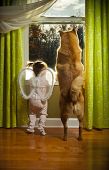 foto of dog  - Baby girl and dog watching outside the window - JPG 