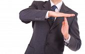 foto of businessmen  - Businessman showing time out sign with hands - JPG 