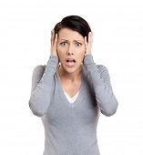 pic of pressure  - Confused woman puts her hands on the head - JPG 