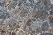 image of conglomerate  - untreated surface of the stone extracting minerals in a career - JPG 