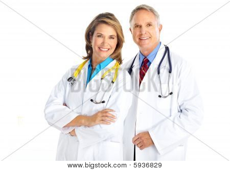 Picture or Photo of Smiling medical doctors with stethoscope. Isolated over white background