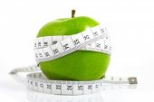 foto of sports  - Green apples measured  the meter - JPG 
