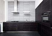 foto of interior  - Part of modern minimalism style kitchen interior in monochrome tones - JPG 