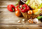 stock photo of art  - Healthy Organic Vegetables on a Wooden Background - JPG 