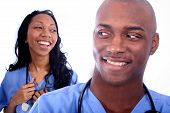 stock photo of bloodpressure  - African American Man and Woman Medical Workers - JPG 