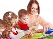 stock photo of art  - Kindergarden teacher with group children - JPG 