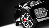 picture of art  - a modern and elegant black car illuminated - JPG 