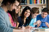 picture of group  - Group of young students working and studying in a college library - JPG 