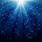 image of holidays  - Snow and stars are falling on the background of blue luminous rays - JPG 