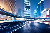 picture of buildings  - the light trails on the modern building background in shanghai china - JPG 