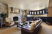 foto of home  - Basement in luxury home with stone fireplace - JPG 