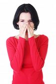 stock photo of pressure  - Young woman with sinus pressure pain  - JPG 
