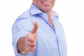 pic of handshake  - cutout picture of a casual senior man offering a handshake with a smile - JPG 